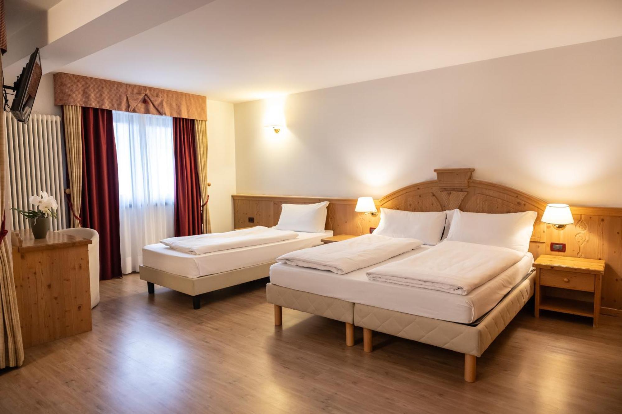 Golf Hotel Folgaria Pokoj fotografie